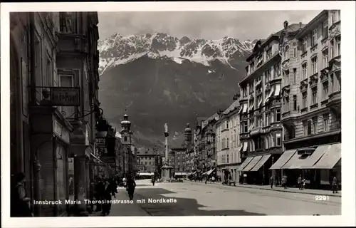Ak Innsbruck in Tirol, Maria Theresienstraße mit Nordkette, Annasäule, Geschäfte