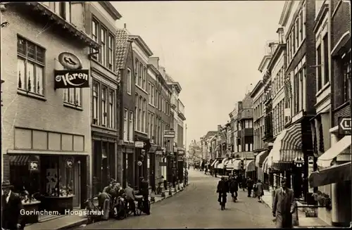 Ak Gorinchem Südholland Niederlande, Hoogstraat, Geschäfte, Passanten