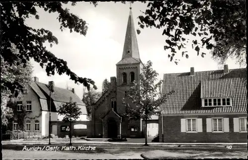 Ak Aurich in Ostfriesland, Katholische Kirche, Straßenpartie