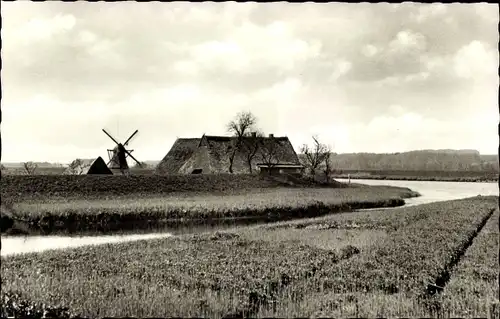 Ak Itzehoe in Holstein, Bauernhof in der Marsch, Windmühle