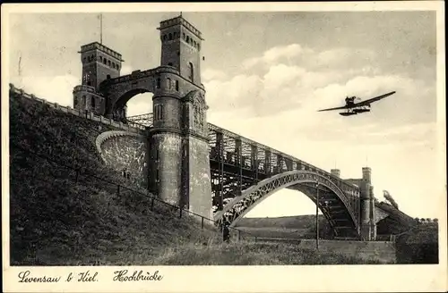 Ak Levensau Neuwittenbek in Schleswig Holstein, Wasserflugzeug über der Hochbrücke