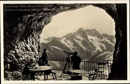Ak Grindelwald Kanton Bern, Ausblick auf Schreckhorn, Jungfraubahn, Station Eismeer