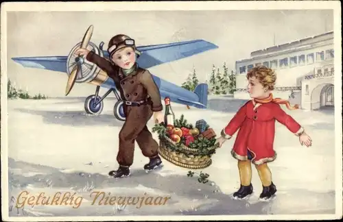 Ak Glückwunsch Neujahr, Pilot und Junge tragen Korb mit Klee und Sektflasche, Flugzeug
