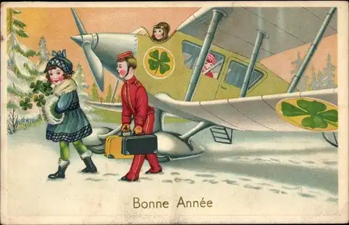 Ak Glückwunsch Neujahr, Flugzeug, Portier mit Koffern, Mädchen, Kleeblätter