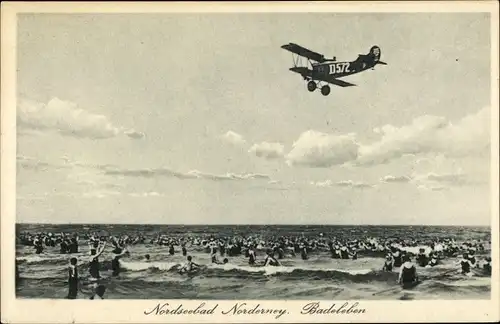 Ak Norderney in Ostfriesland, Badeleben am Strand, Flugzeug D572