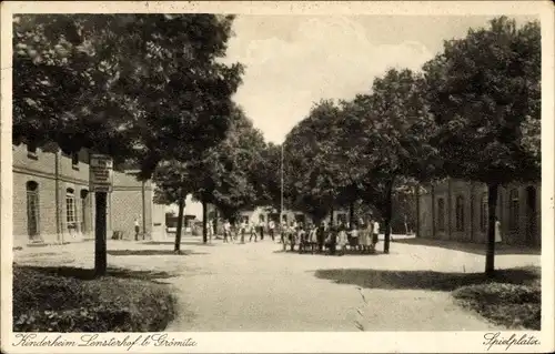 Ak Lenste Grömitz in Ostholstein, Kinderheim Lensterhof, Spielplatz