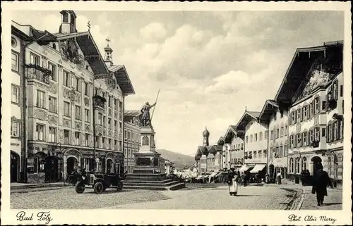 Ak Bad Tölz im Isartal Oberbayern, Straßenpartie, Denkmal