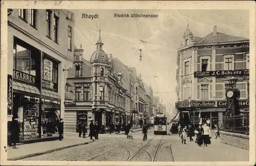 Ak Rheydt Mönchengladbach am Niederrhein, Friedrich Wilhelmstraße, Geschäfte, Straßenbahn