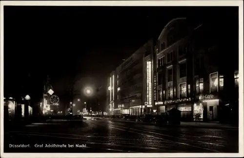 Ak Düsseldorf am Rhein, Graf Adolfstraße bei Nacht