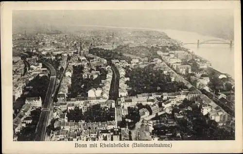 Ak Bonn in Nordrhein Westfalen, Ballonaufnahme vom Ort, Rheinbrücke, Bahnstrecke, Kirche