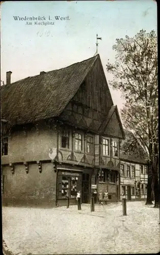 Ak Wiedenbrück Rhedewiedenbrück, Am Kirchplatz,Geschäft