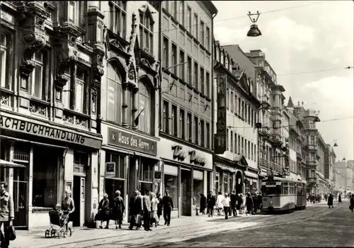 Ak Gera in Thüringen, Sorge mit Straßenbahn, Haltestelle, Buchhandlung, Haus des Herrn