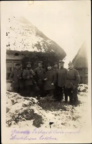 Foto Ak Deutsche Soldaten in Uniformen, Feldartillerie, Landsturm Cottbus, Winter, I WK