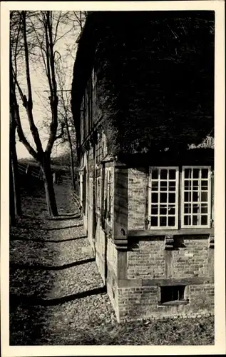 Foto Ak Kollmar an der Niederelbe, Reetdachhaus, Teilansicht