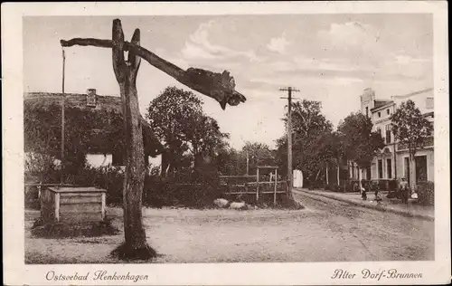 Ak Ustronie Morskie Henkenhagen Pommern, Alter Dorfbrunnen