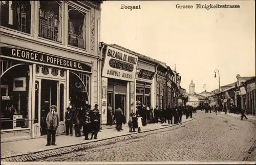 Ak Focșani Fokschan Rumänien, Große Kinigkeitsstraße, Geschäft, Inh. George J. Poppescu