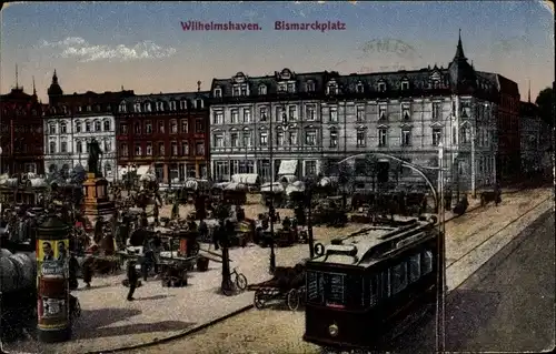 Ak Wilhelmshaven an der Nordsee, Bismarckplatz, Straßenbahn, Litfaßsäule, Denkmal