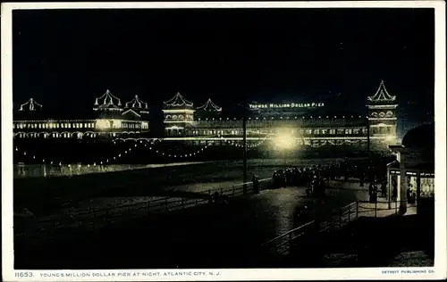 Ak Atlantic City New Jersey USA, Young's Million Dollar Pier bei Nacht