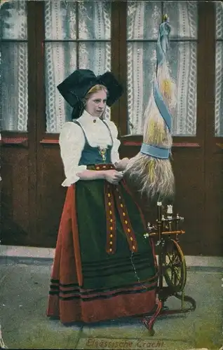 Ak Elsässische Tracht, Elsässerin am Spinnrad