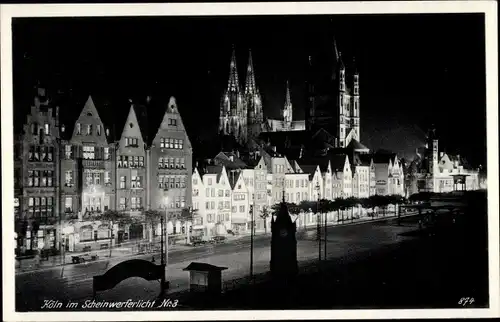 Ak Köln am Rhein, Kölner Dom, Groß St. Martin, Nachtbeleuchtung