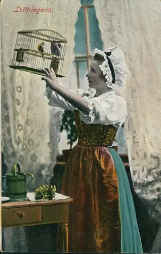 Ak Lothringerin, Frau in Volkstracht, Vogel im Käfig