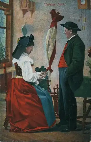 Ak Frau und Mann in Elsässer Tracht, Portrait am Spinnrad