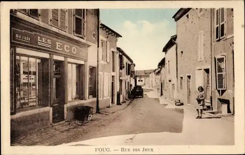 Ak Foug Lothringen Meurthe et Moselle, Rue de Jeux, Straßenpartie