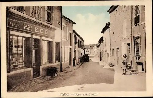 Ak Foug Lothringen Meurthe et Moselle, Rue de Jeux, Straßenpartie