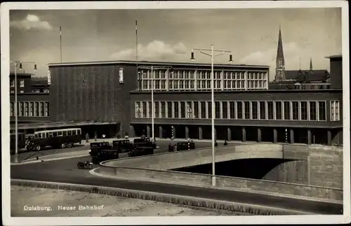 Ak Duisburg im Ruhrgebiet, Neuer Bahnhof, Außenansicht, Kirchturm