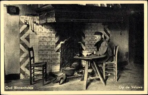 Ak Hoge Veluwe Gelderland Niederlande, Bauer am Kamin