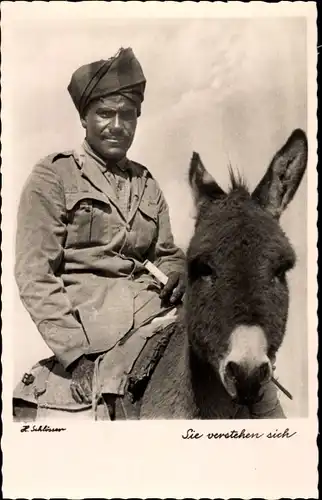 Foto Mann auf einem Esel, Foto H. Schlösser