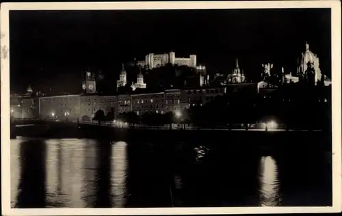 Ak Salzburg in Österreich, beleuchtete Stadt bei Nacht