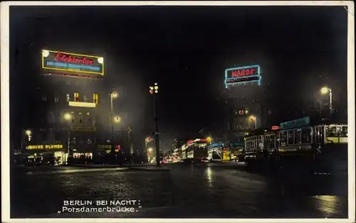 Ak Potsdam, Potsdamer Brücke bei Nacht, Geschäfte