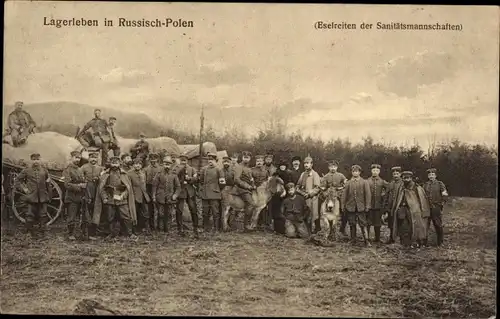 Ak Deutsche Soldaten, Lagerleben in Russisch Polen, Sanitätsmannschaften, Eselreiten, 1. WK