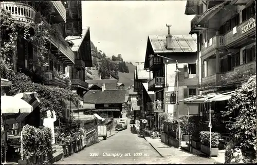 Ak Champéry Kanton Wallis, Straßenpartie, Restaurant