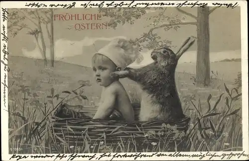 Ak Glückwunsch Ostern, Baby und Osterhase im Korb