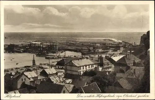 Ak Helgoland in Schleswig Holstein, Blick auf zerstörtes Hafengelände vom Oberland aus