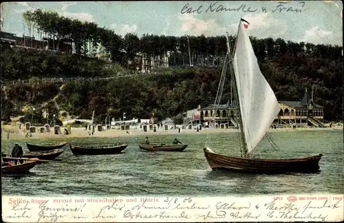 Ak Ostseebad Sellin auf Rügen, Strand mit Strandhallen und Hotels, Segelboot