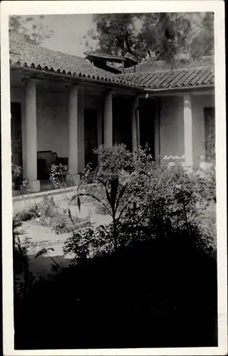 Foto Ak Duitama Bolivien, Partie in einem Garten 1930
