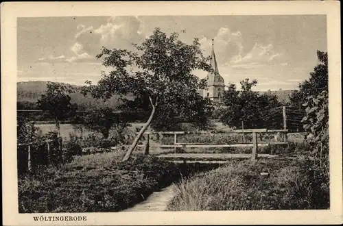 Ak Wöltingerode Vienenburg Goslar am Harz, Bach mit Brücke, Kirche