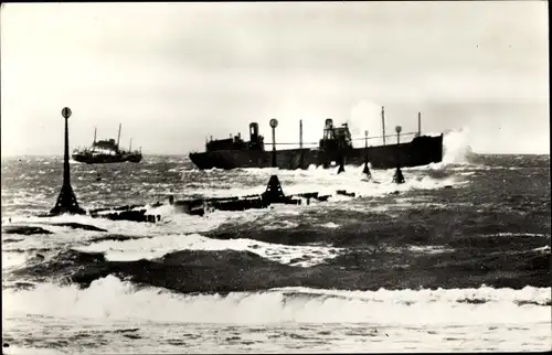 Ak SS Spanker, englisches Kohleboot, nachts auf dem Norrderpier in Hoek gestrandet