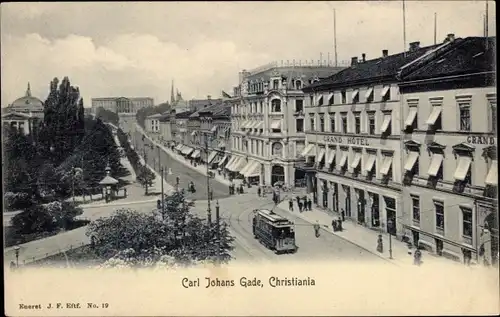 Ak Christiania Oslo Norwegen, Straßenpartie, Carl Johans Gade, Straßenbahn, Grand Hotel
