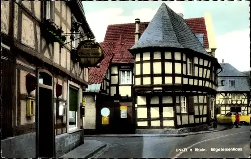 Ak Unkel am Rhein, Blick zum Bügeleisenhaus, Fachwerk