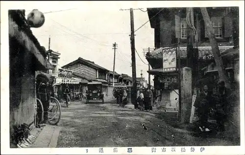 Ak Japan, Straßenpartie in einem Ort