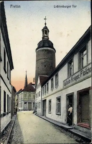 Ak Stadt Prettin Annaburg im Kreis Wittenberg, Lichtenburger Tor, Fleischerei