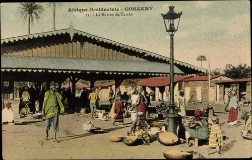 Ak Konakry Conakry Guinea, Afrique Occidentale, Le Marché de Tombo, Straßenlaterne