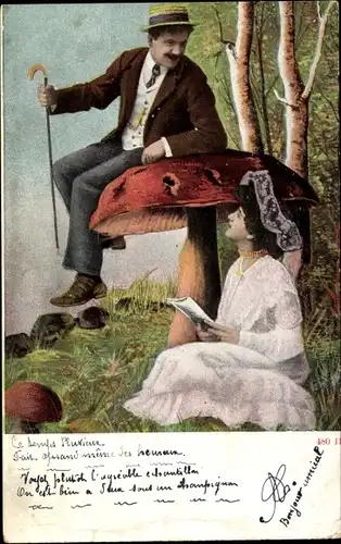 Ak Mann auf dem Schirm eines Pilzes sitzend, lesende Frau