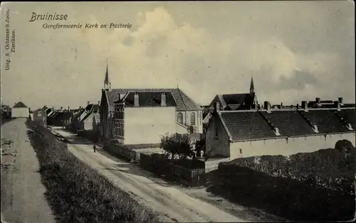 Ak Bruinisse Zeeland, Kirche und Pfarrhaus