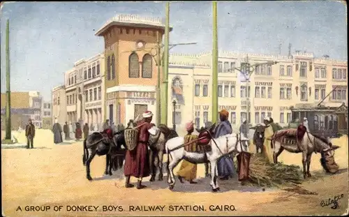 Ak Kairo Kairo Ägypten, eine Gruppe Eselsjungen am Bahnhof