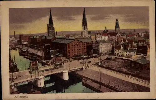 Ak Duisburg im Ruhrgebiet, Ortsansicht, Brücke, Dämmerung